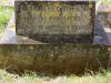 Leaded text on base of gravestone