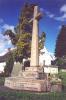 Granite cross on three stepped octagonal base
