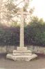 Rough hewn cross on three step base