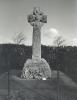 Granite wheel cross on tapering base