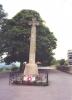 Large Celtic cross in fenced square area