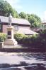 Stone figure on pedestal