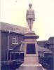 Stone figure on pedestal
