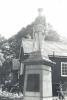 Stone figure on pedestal