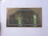 Brass plaque with inscription