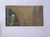 Brass plaque with inscription