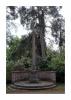 Stone cross on roughly circular stone stepped base