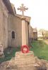 Cross on tapering plinth