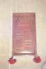 Wooden board roll of honour with names in different paint colors