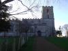Maxey Church, with the Memorial Cross in foreground