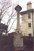 Celtic cross with inscription on its base