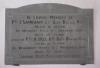 Stone tablet with names inscribed in black
