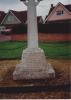 Wheel cross on tapering plinth