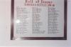 White, framed roll of honour with names in two columns