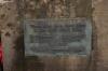 Plaque on side of plinth