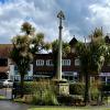 Stone calvary cross with gabled top