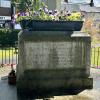 Stone calvary cross with gabled top
