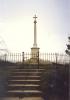 Tall cross on octagonal plinth