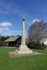 Celtic cross on tapering plinth with two stepped inscribed base
