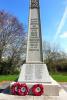 Celtic cross on tapering plinth with two stepped inscribed base
