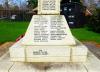 Celtic cross on tapering plinth with two stepped inscribed base