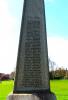 Celtic cross on tapering plinth with two stepped inscribed base
