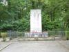 Cenotaph on cruciform base with accompanying plaques