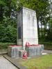 Cenotaph on cruciform base with accompanying plaques