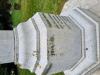 An octagonal marble memorials with a Latin cross, plinth, base and Sword of Sacrifice. Commemorating those who died in WW1 and WW2. Date