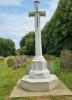 An octagonal marble memorials with a Latin cross, plinth, base and Sword of Sacrifice. Commemorating those who died in WW1 and WW2.