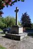 Rough hewn stone cross on stepped base