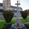 Granite cross in corner of churchyard.