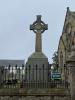 Memorial topped with a Celtic cross