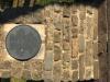 Round metal plaque