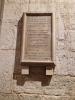 Stone tablet in raised moulded frame