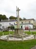 Cross on tapering plinth