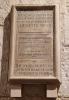Stone tablet in raised moulded frame