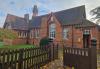 Exterior front of Catherine-de-Burgh Village Hall (former Church/School).