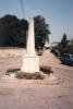 Memorial obelisk at road junction