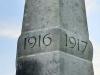 The dates 1916 1917 carved into the upper part of the obelisk