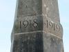 The dates 1918 1919 carved into the upper part of the obelisk
