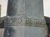 The words LORD BE THE carved into the middle part of the obelisk