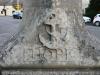 Detail of a carving on the obelisk showing an anchor and the word HOPE