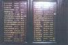 Wooden panel with inscription in gold painted lettering