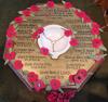 Octagonal brass plaque on font, re Catherine-de-Barnes parishioners who died in WW1.