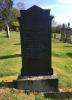 Tall polished granite gravestone