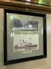 Framed photos of ships
