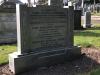 Rectangular granite family gravestone with a stepped top