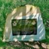 Multicolored stone with landscape oriented plaque