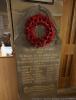 WW1 tablet, with poppy wreath attached above inscription